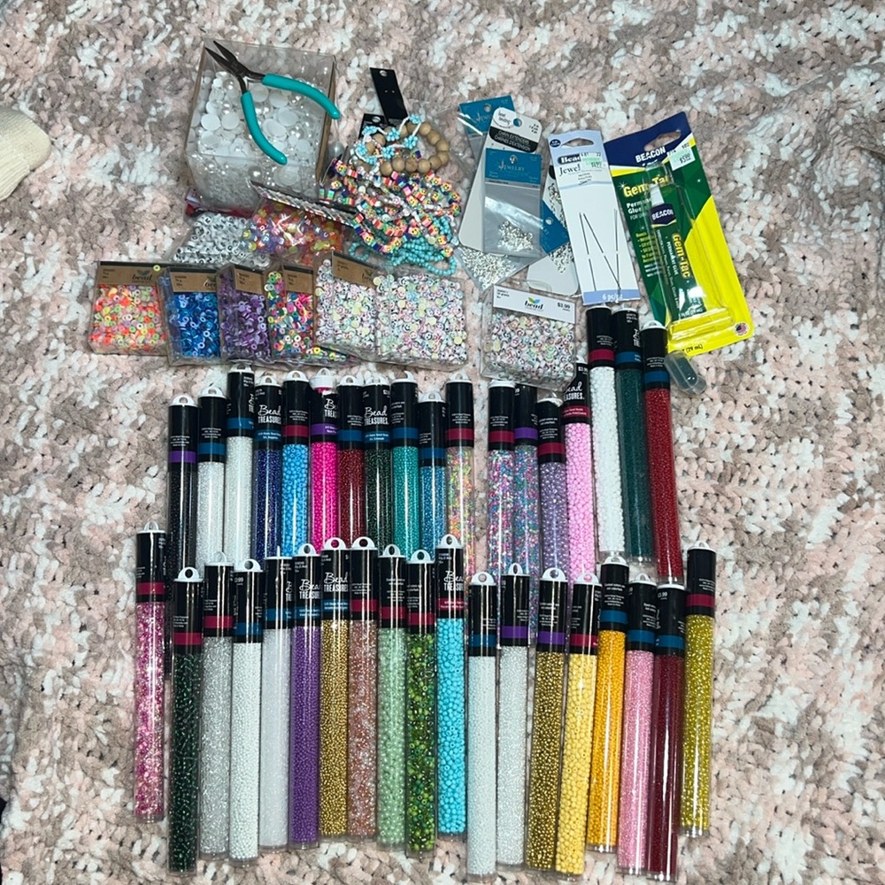 Bulk beads and jewelry making supplies. Most brand new, never opened.